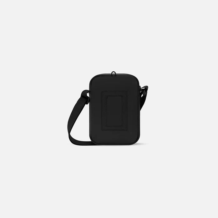 Sherpani Rogue Chromatic Black Mini Crossbody, back view showing back pocket on white background.   #color_chromatic-black