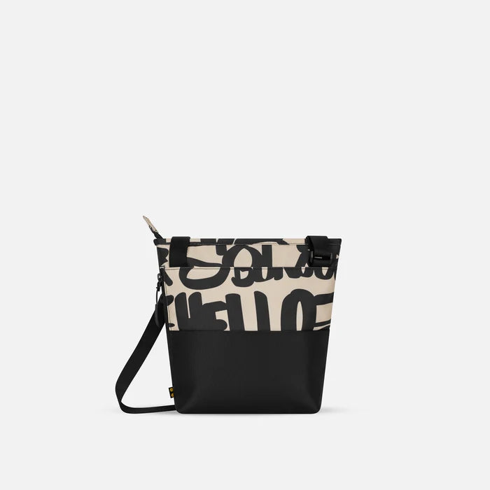 A Sherpani Sadie Ciao Crossbody Bag, back view showing the side pocket.  #color_ciao-print