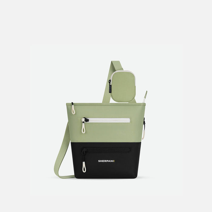 A Sherpani Sadie Palm Green Crossbody Bag, front view showing lockable Pocket & strap pouch against white backdrop. #color_palm-green