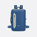 A Sherpani Santiago Seastone Travel Backpack, front view showing various lockable pockets and straps on white backdrop. #color_seastone