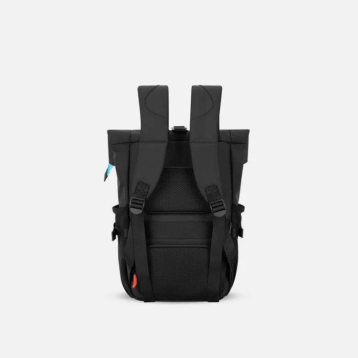 A Sherpani Sedona Chromatic Black Backpack, back view showing shoulder straps and luggage strap on white background. #color_chromatic-black