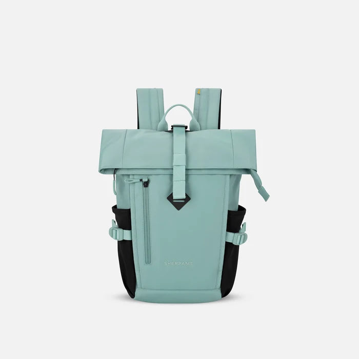 A Sherpani Sedona Surf Blue Backpack, front view showing buckled pockets and straps on white backdrop. #color_surf-blue