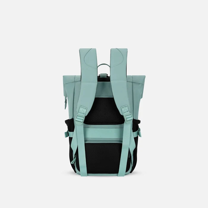 A Sherpani Sedona Surf Blue Backpack, back view showing shoulder straps and luggage strap on white background. #color_surf-blue