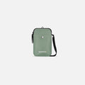 A Sherpani Simplicity Aloe Mist Green Anti-Theft Crossbody Wallet, front view showing pocket and strap on white background. #color_aloe-mist-green