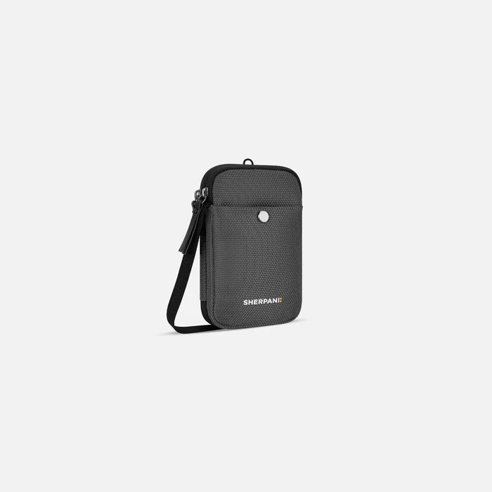 A Sherpani Simplicity Granite Anti-Theft Crossbody Wallet, 3/4 view showing main pocket and strap on a white background. #color_granite-grey