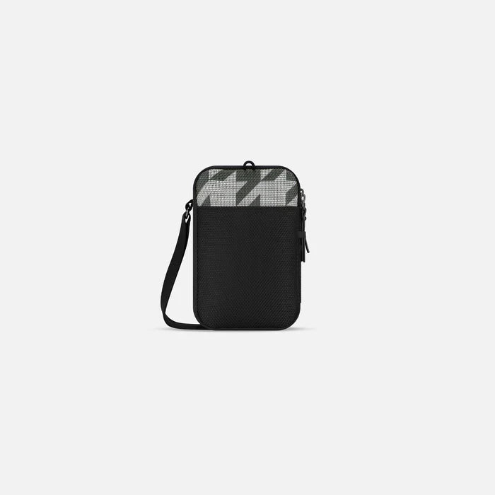 A Sherpani Simplicity Houndstooth Anti-Theft Crossbody Wallet back view showing back pocket against white background. #color_houndstooth-print