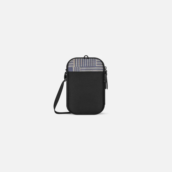 A Sherpani Simplicity Passport Anti-Theft Crossbody Wallet back view showing back pocket against white background. #color_passport-print