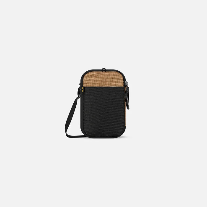 A Sherpani Simplicity Sand Anti-Theft Crossbody Wallet back view showing back pocket against white background. #color_sand-tan