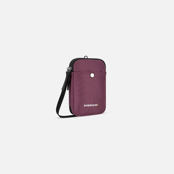 A Sherpani Simplicity Smoky Orchid Anti-Theft Crossbody Wallet, 3/4 view showing main pocket and strap on a white background. #color_smoky-orchid-pink