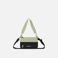 A Sherpani Palm Green Shoulder Bag, front view showing lockable pocket and strap options on white backdrop. #color_palm-green
