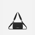 A Sherpani Raven Black Shoulder Bag, front view showing lockable pocket and strap options on white backdrop.  #color_raven-black