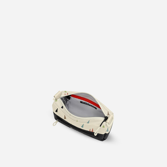 A Sherpani Terrazzo Print Shoulder Bag, above view showing inside pockets on a white backdrop. #color_terrazzo-print