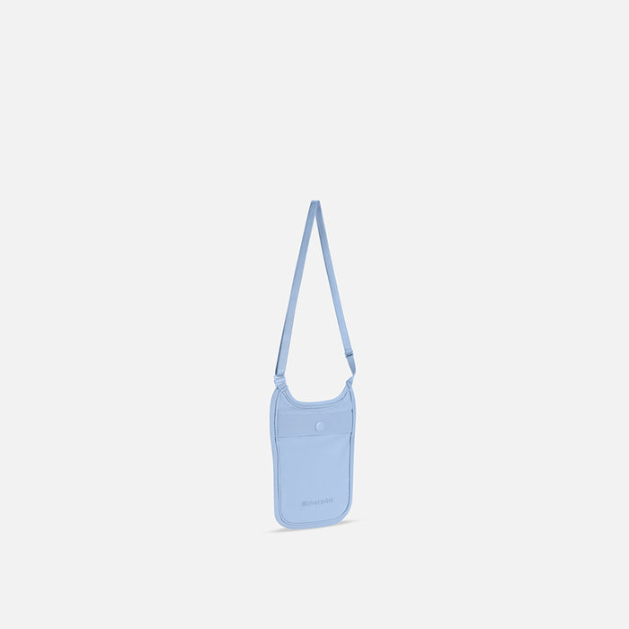 A Sherpani Soft Touch Concealed Neck Wallet Cool Blue, 3/4 view showing front pocket & adjustable strap on white background.