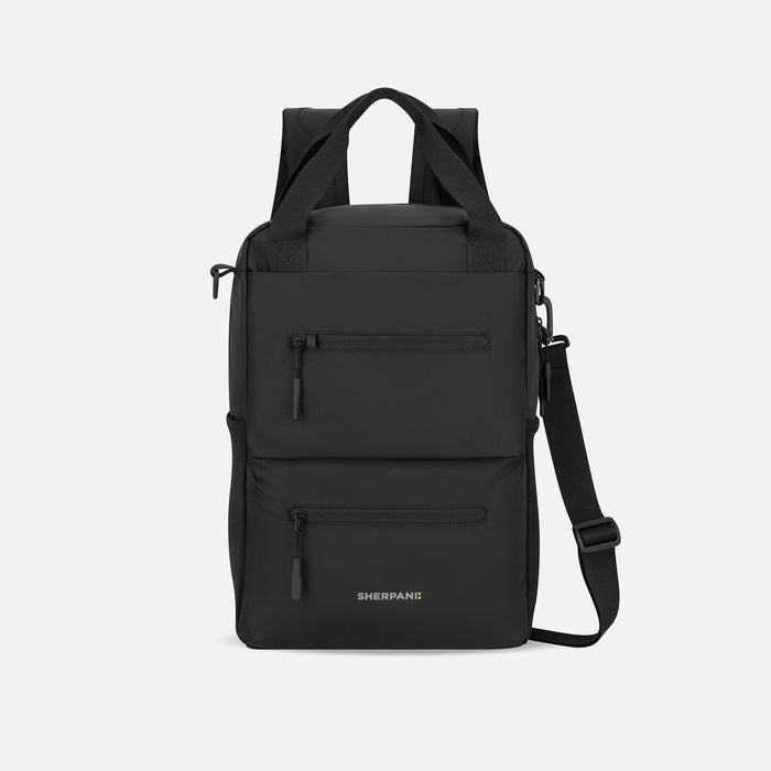 A Sherpani Sojourn Black Multi-Wear Pack, front view showing lockable pocket and various straps on white backdrop. #color_black