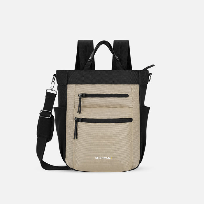 A Sherpani Soleil Straw Beige Anti-theft Multi-Wear Travel Bag, front view showing lockable pockets and straps on white backdrop.#color_straw-beige