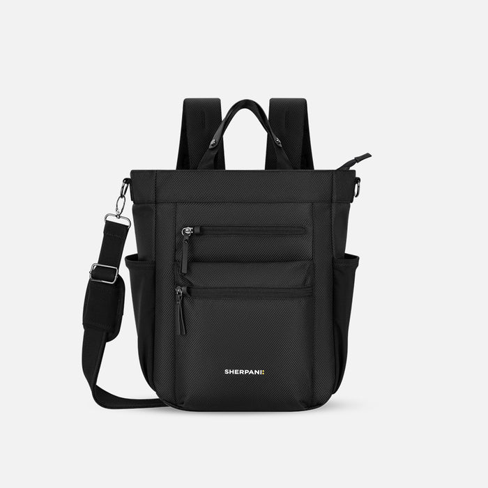 A Sherpani Soleil Carbon Black Anti-theft Multi-Wear Travel Bag, front view showing lockable pockets and straps on white backdrop. #color_carbon-black