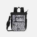 A Sherpani Soleil Sakura Anti-theft Multi-Wear Travel Bag, front view showing lockable pockets on white backdrop. #color_sakura-signature