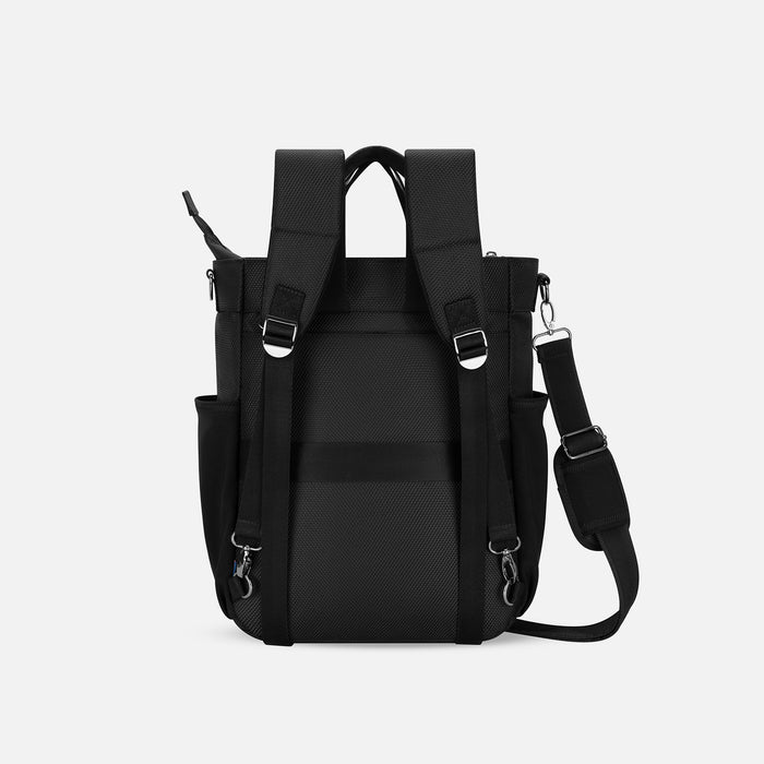 A Sherpani Soleil Sakura Anti-theft Multi-Wear Travel Bag, back view showing shoulder and luggage straps on white backdrop. #color_sakura-signature