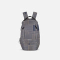 A Sherpani Solstice Passport Anti-Theft Travel Backpack, front view showing front pockets and different straps on white background.  #color_passport-print