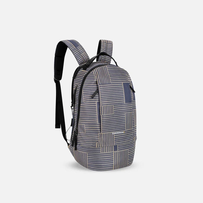 A Sherpani Solstice Passport Anti-Theft Travel Backpack, 3/4 view showing back strap pockets and different strap options against a white background.  #color_passport-print