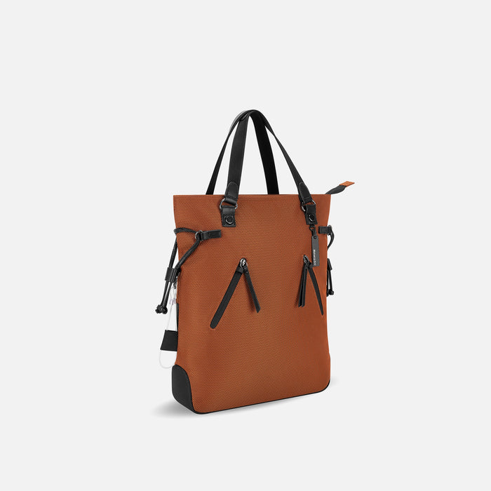 A Sherpani Tempest Morocco Convertible Tote, 3/4 view showing lockable pockets & straps against white background. #color_morocco