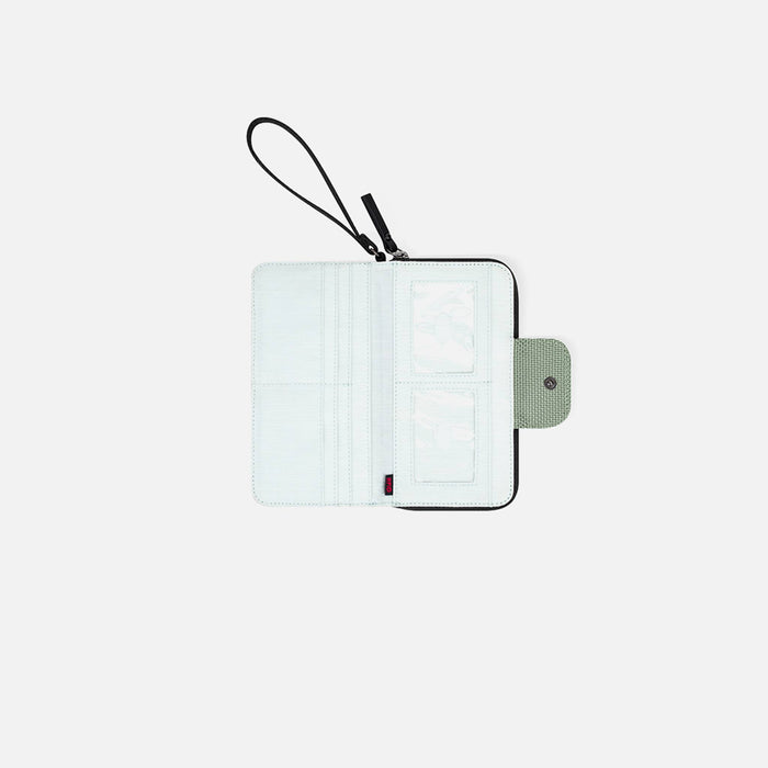 A Sherpani Tulum Aloe Mist Green Anti-theft RFID Wallet, above view showing inside of  wallet on white backdrop. #color_aloe-mist-green