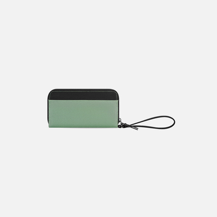 A Sherpani Tulum Aloe Mist Green Anti-theft RFID Wallet, back view showing wrist strap on white backdrop. #color_aloe-mist-green