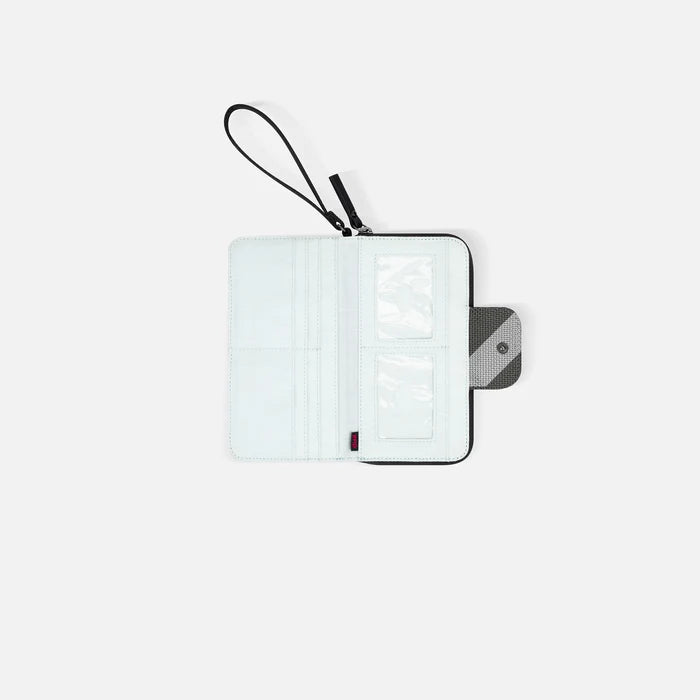 A Sherpani Tulum Houndstooth Anti-theft Wallet, above view showing inside of  wallet on white backdrop.  #color_houndstooth-print