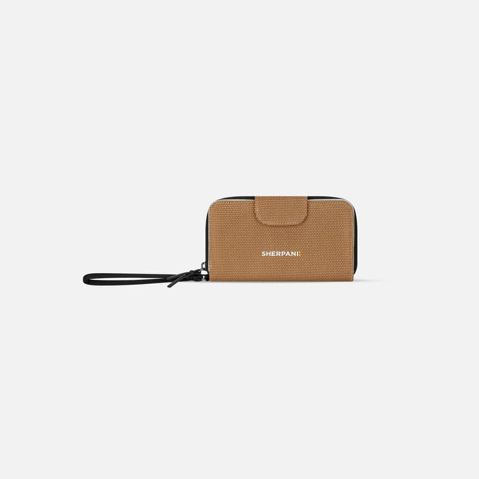 A Sherpani Tulum Sand Anti-Theft Wallet, front view showing wrist strap and clasp on white background. #color_sand-tan