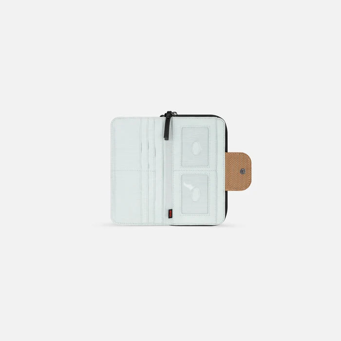 A Sherpani Tulum Sand Anti-theft Wallet, above view showing inside of  wallet on white backdrop.  #color_sand-tan