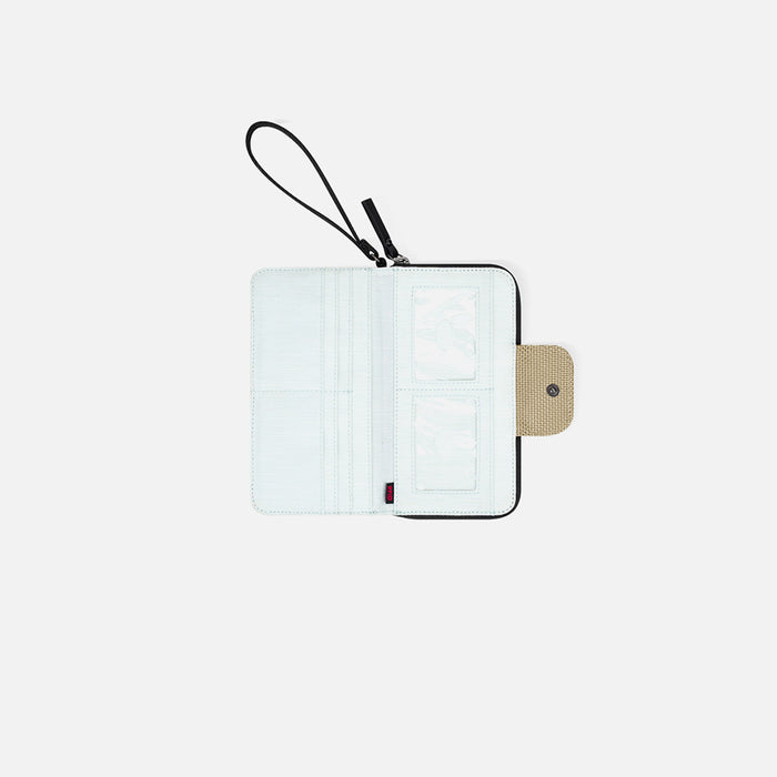 A Sherpani Tulum Straw Beige Anti-theft RFID Wallet, above view showing inside of  wallet on white backdrop. #color_straw-beige