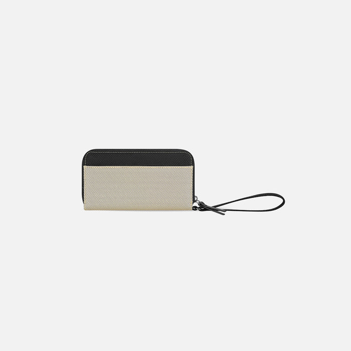 A Sherpani Tulum Aloe Mist Green Anti-theft RFID Wallet, back view showing wrist strap on white backdrop #color_straw-beige
