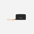 A Sherpani Tulum Chromatic Black RFID Wallet, front view showing wrist strap and clasp on white background. #color_chromatic-black