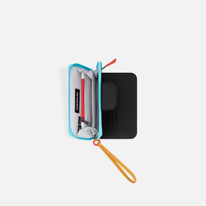 A Sherpani Tulum Chromatic Black RFID Wallet, above view showing inside of  wallet on white backdrop.  #color_chromatic-black