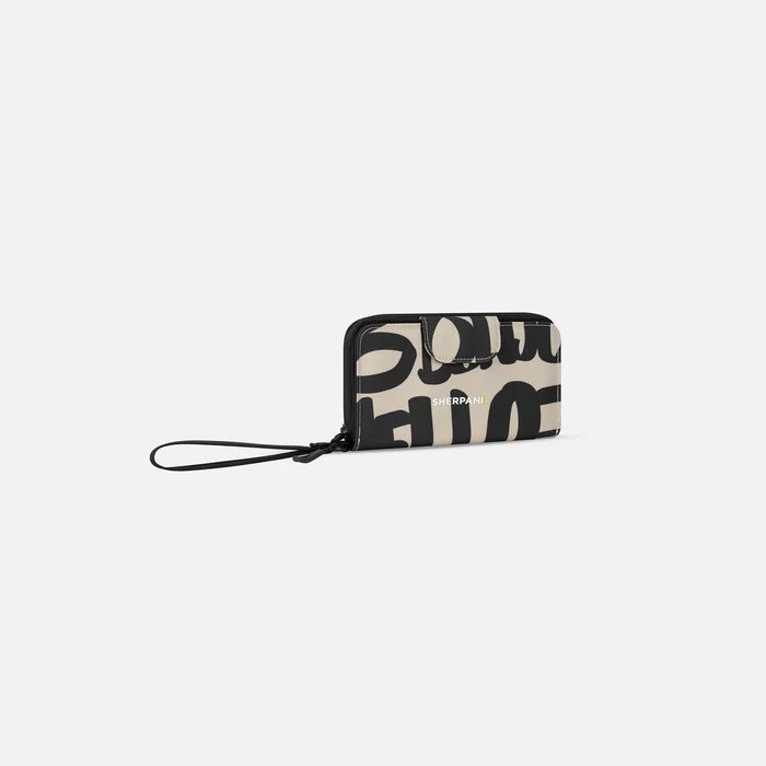 A Sherpani Tulum Ciao RFID Wallet, 3/4 view showing wrist strap and clasp on white background. #color_ciao-print