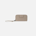 A Sherpani Tulum Dune RFID Wallet, front view showing wrist strap and clasp on white background. #color_dune-tan