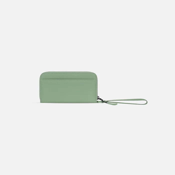 A Sherpani Tulum Olivine RFID Wallet, back view showing wrist strap on white background. #color_olivine-green