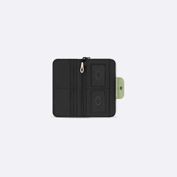 A Sherpani Tulum Palm Green RFID Wallet, above view showing inside of  wallet on white backdrop. #color_palm-green