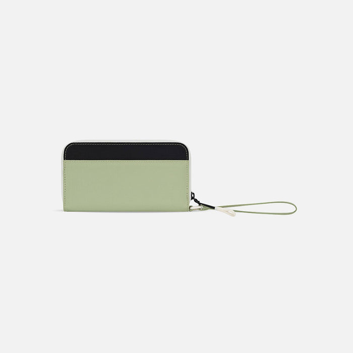 A Sherpani Tulum Palm Green RFID Wallet, back view showing wrist strap on white background.  #color_palm-green