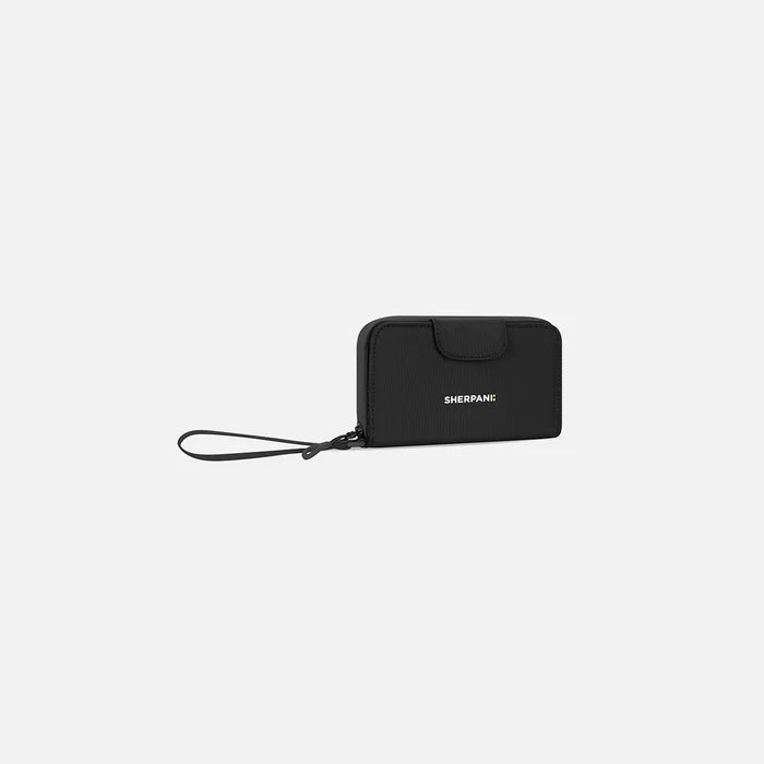 A Sherpani Tulum Raven Black RFID Wallet, 3/4 view showing wrist strap and clasp on white background. #color_raven-black