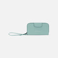 A Sherpani Tulum Surf Blue RFID Wallet, front view showing wrist strap and clasp on white background. #color_surf-blue