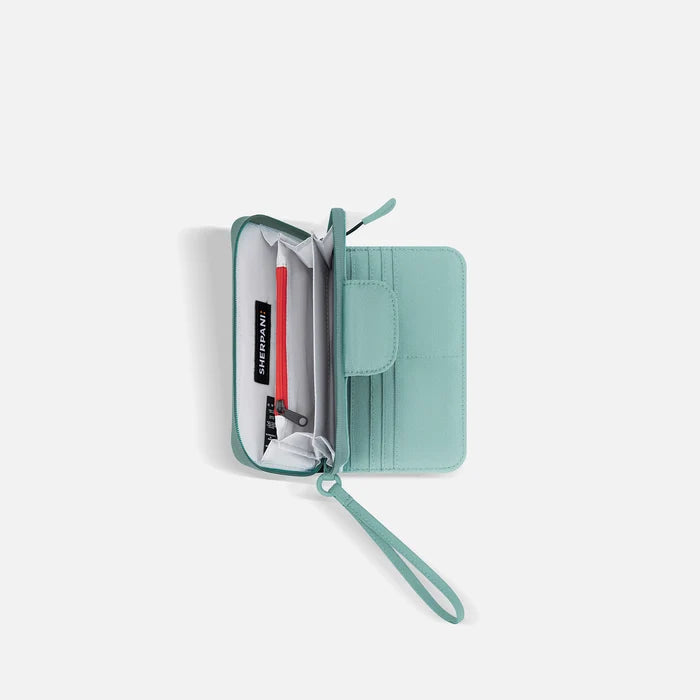 A Sherpani Tulum Surf Blue RFID Wallet, above view showing inside of  wallet on white backdrop.  #color_surf-blue