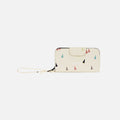A Sherpani Tulum Terrazzo Print RFID Wallet, front view showing wrist strap and clasp on white background.  #color_terrazzo-print