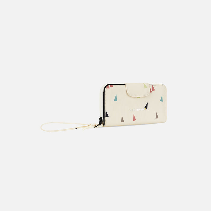 A Sherpani Tulum Terrazzo Print RFID Wallet, 3/4 view showing wrist strap and clasp on white background.   #color_terrazzo-print