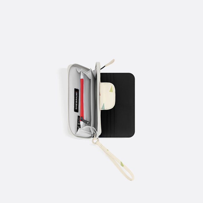 A Sherpani Tulum Terrazzo Print RFID Wallet, above view showing inside of  wallet on white backdrop. #color_terrazzo-print
