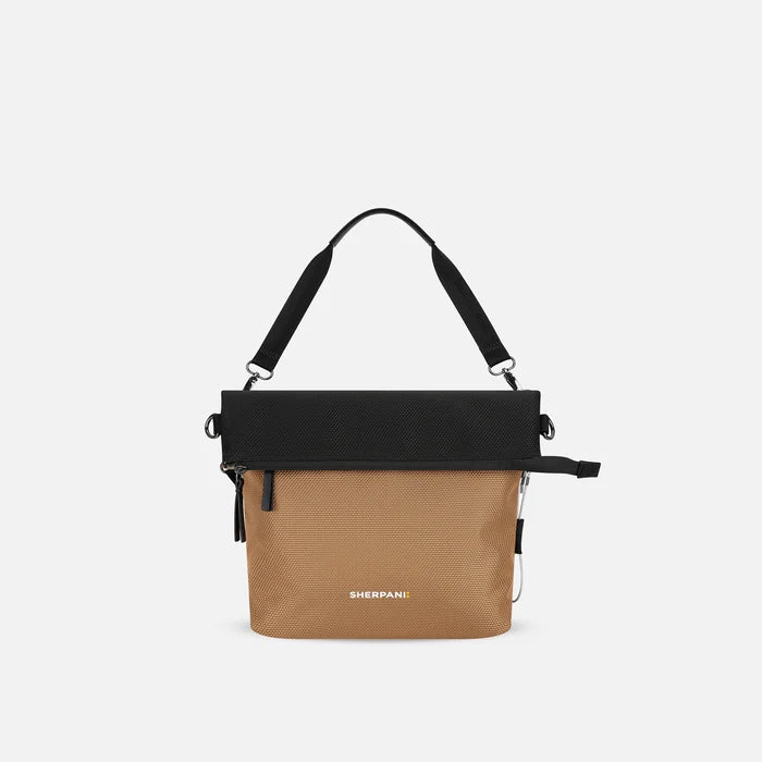 A Sherpani Vale Sand Anti-theft Reversible Crossbody, front view showing folded over front on white background.  #color_sand-tan