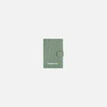 A Sherpani Vienna Aloe Mist Green Anti-theft Passport Wallet, front view against white background. #color_aloe-mist-green