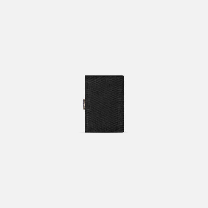 A Sherpani Vienna Passport Anti-theft Passport Wallet, back view against white background. #color_passport-print