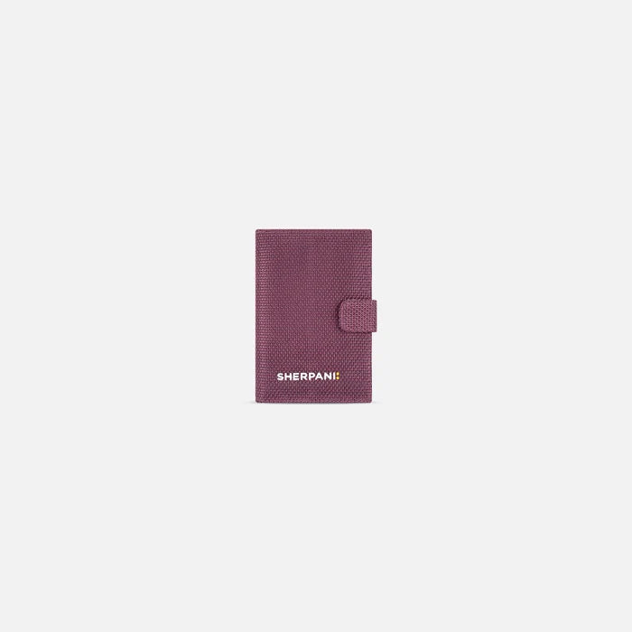 A Sherpani Vienna Smoky Orchid Anti-theft Passport Wallet, front view against white background. #color_smoky-orchid-pink
