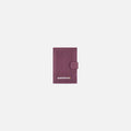 A Sherpani Vienna Smoky Orchid Anti-theft Passport Wallet, front view against white background. #color_smoky-orchid-pink